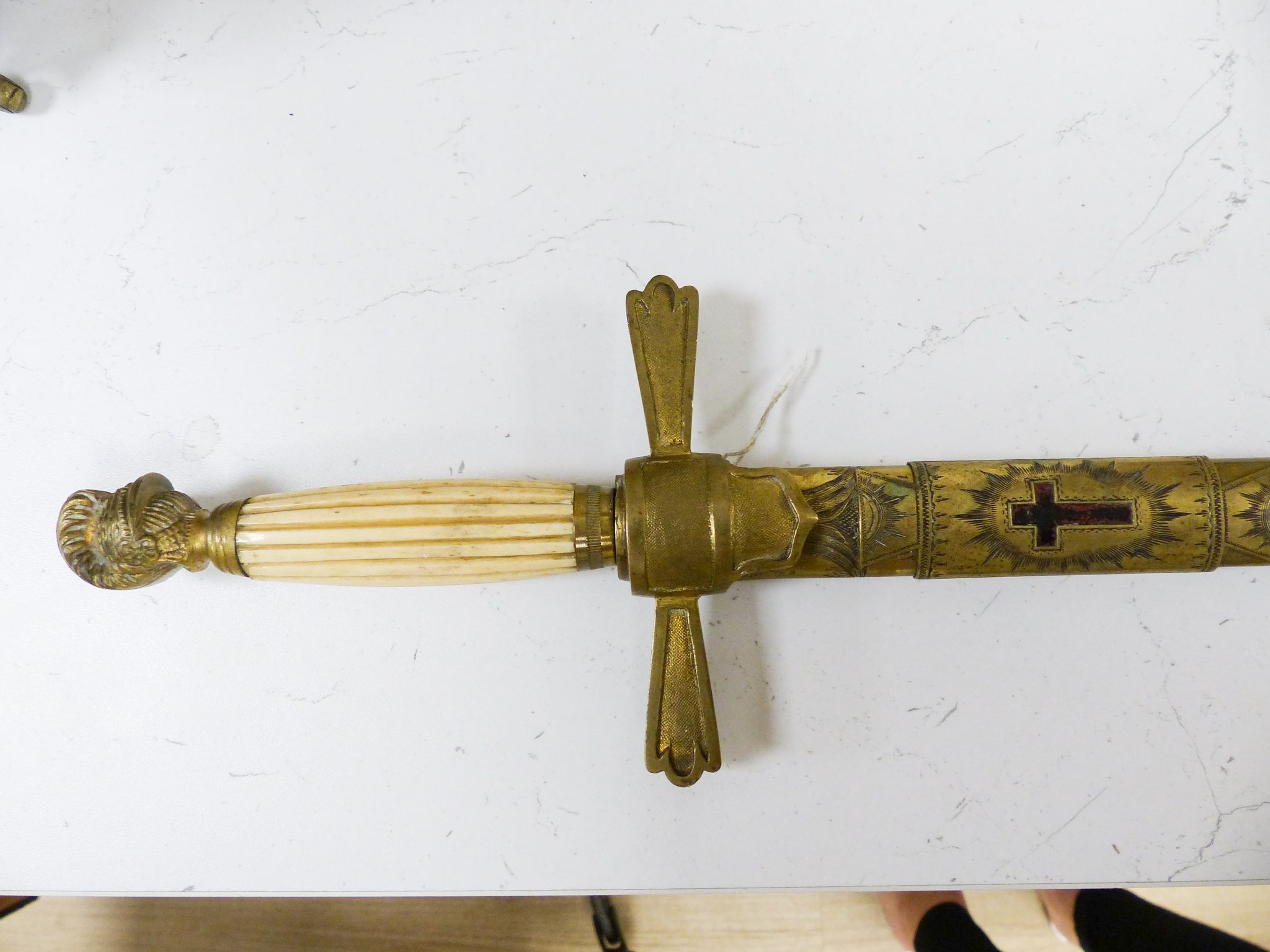 A late 19th/early 20th century bone handled court sword, 90cm